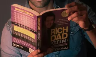 Rich Dad Poor Dad highlights the contrasting mindsets of the wealthy and the poor, teaching essential lessons on financial independence and smart money management.